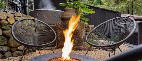 Fire table and hot tub so close you can enjoy both