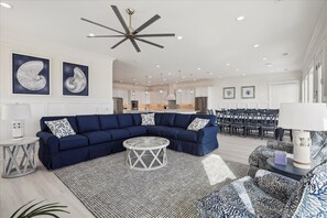 The ocean front living room is well-appointed with comfortable furnishings.