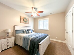 Comfy Queen size bed with spacious closets.