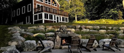 House with outdoor firepit