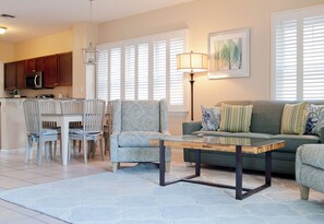 The open living room area has cable TV. 