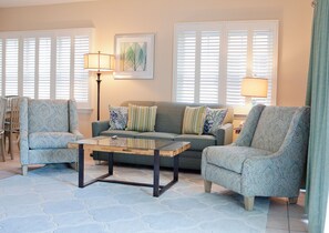 The open living room area has cable TV. 