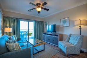 The open living room area features cable TV. 