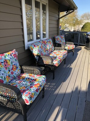 awning is located right above this furniture for some shade from the sun