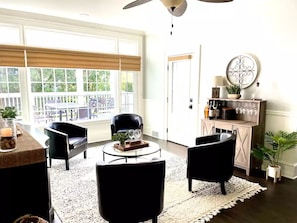 Sitting room with table and chairs.