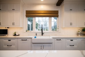 Custom cabinets with built- in appliances.