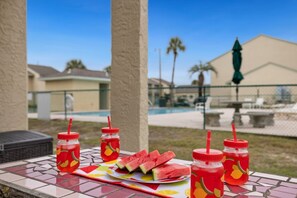 The back patio overlooks one of the heated pools on property and is only steps from your back patio.