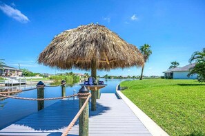 Relax and  Enjoy a Drink under the Tikki Hut