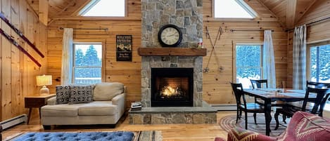 Living room with TV and gas fireplace