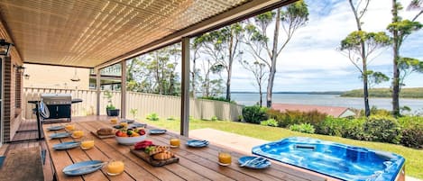 Alfresco dining area with gas BBQ and amazing views of lake 