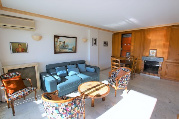 air conditioned living room, lounge & dining area, tv, wifi