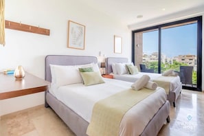 Bedroom with 2 double/full beds and private terrace