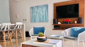Modern living space. Smart TV & comfy seating included.