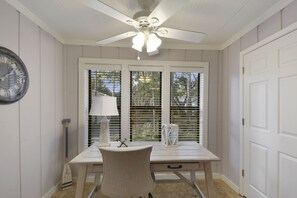 Bright Work Desk by the Window - Stay productive at this bright work desk, perfectly positioned by a window for natural light and focus.
