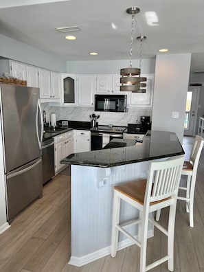 Fully stocked kitchen.