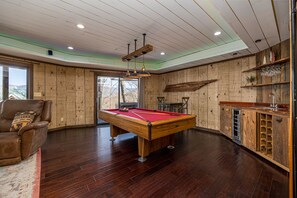Entertainment: pool table w/ wet bar with a wine cooler & storag