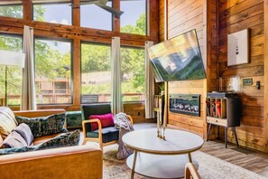 The large windows in the living room bring in plenty of natural light 