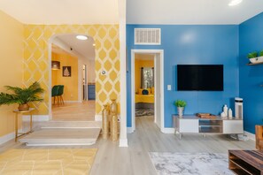 Livingroom: Bedroom 2 door on the right; Kitchen entrance on the left