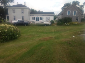 The Southeast side of the house has the view of Sawyer's Cove and beyond