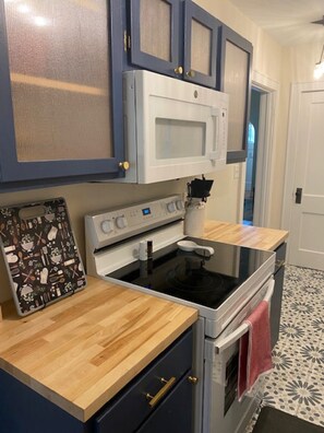 Fully equipped galley kitchen with all new appliances.