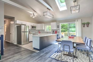 Fully equipped kitchen and massive dining table.
