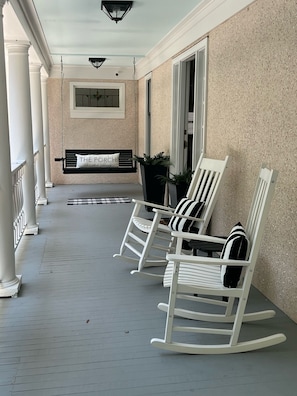 Front Porch leading to Front Door and Overlooks Pool Area