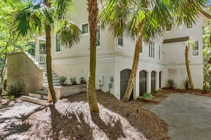 Front of House/ Stairs to Front Door and Porch overlooking Pool