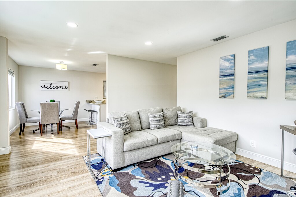 Chic tripleduplex with pool, grills, 3 kitchens, & washer/dryers