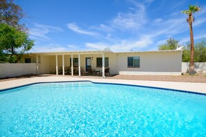 View of the pool and the house (before the backyard makeover).