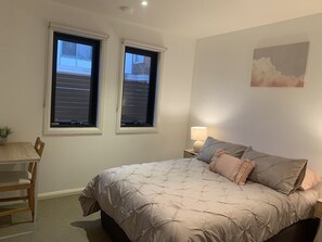 Second bedroom with study table & chair and built in wardrobes 