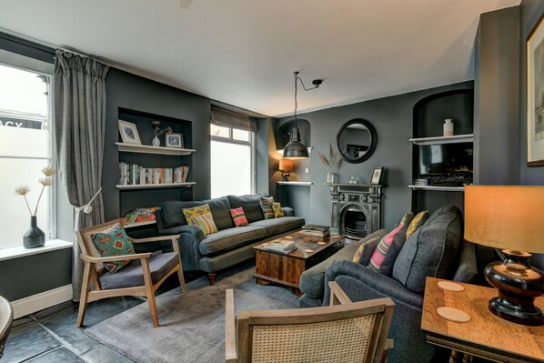 The sitting room area. 2 x 4 seater sofas and 2 x arm chairs