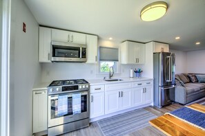 Updated kitchen with stainless steal appliances.