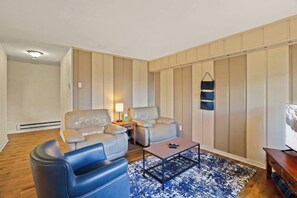 Three comfortable seating options await you in the living area, providing a cozy and inviting space to relax