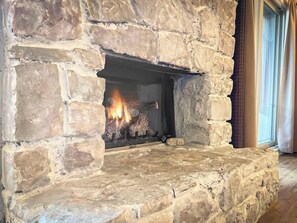 Gather around the warmth of a cozy fireplace.