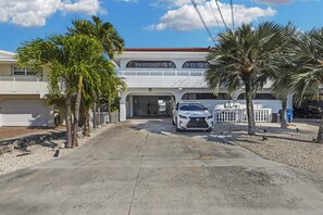 Front of the home with available parking left side of the duplex