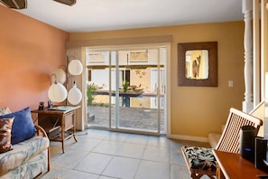 Sliding door to the courtyard/pool area off the livingroom