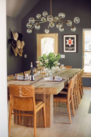 Vintage art compliments the cozy dining room