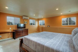 Binge watch a new show on Netflix on the Smart TV in this very spacious bedroom with plenty of windows for lots of natural light, or pull down the room darkening blinds for your well needed mid day nap. 