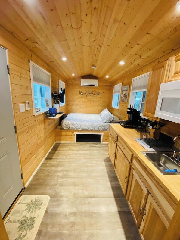 Storage under the bed for luggage and suitcases. 