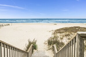 Just steps to the white, sandy beach