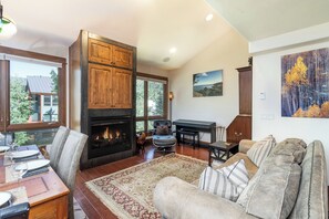 This unit features three landings.  The second level is accessed via set of stairs and features a large open concept living, kitchen and dining area.