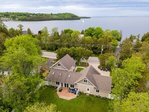 The home is located on Bay Shore Drive and close to Green Bay, but is not a waterfront property