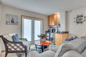 Enjoy the open-concept design, creating a smooth flow between cooking, lounging, and sleeping areas (TV recently added in this room).