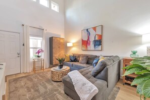 Beautifully decorated living room with sectional sofa