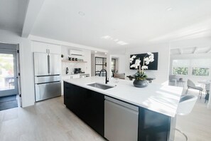 Large, fully stocked kitchen
