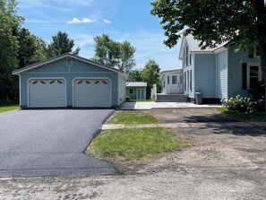 New driveway.  Plenty of space for a boat w/ outdoor outlet to charge batteries