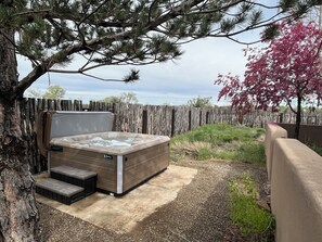  Relax after a long day of hiking or skiing in the spacious hot tub