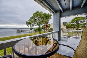 Wrap around balcony, facing Ochlockonee Bay, with table and 2 chairs