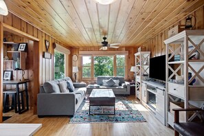 Comfortable living room with fireplace and pull out couches