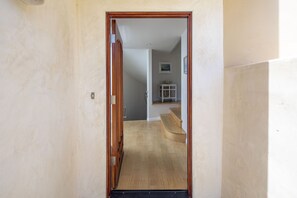 Enter through the front to an open floor plan and a stairway to the downstairs
